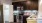 a kitchen with black cabinets