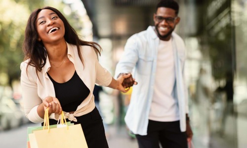 a woman carrying a shopping bag